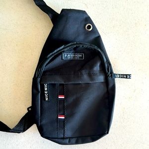 Unisex crossbody bag. Great for traveling  or a day out . Brand new /black